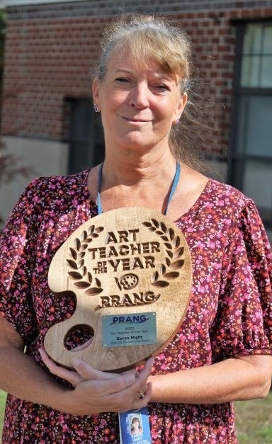 Karen Hight with award in hand
