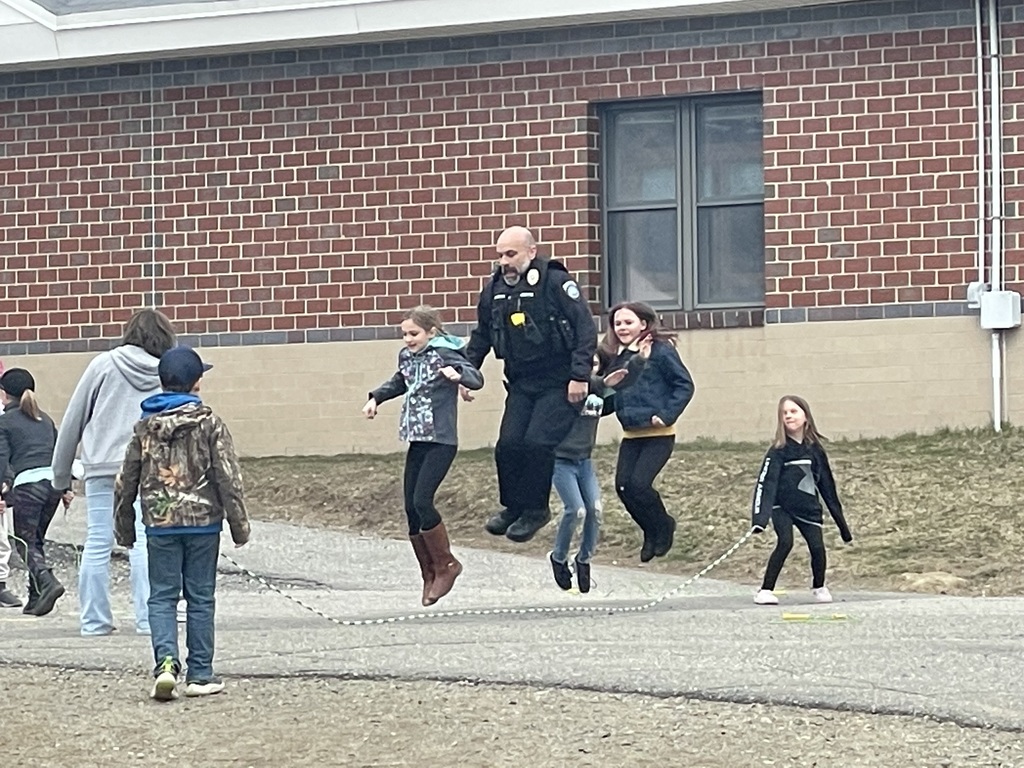 Officer Billy with students at recess!